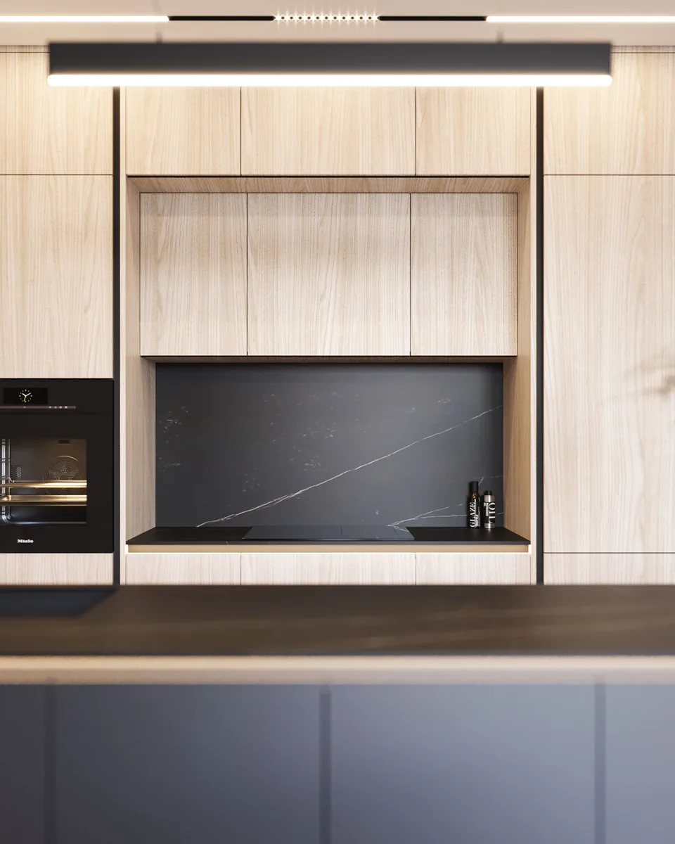 Kuchnia z zabudową w jasnym fornirze, czarnym spiekiem Dekton i piekarnikiem. Projekt wnętrza mieszkania, Warszawa | FILAR MY PROJECT